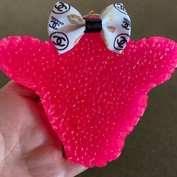 Neon colored cow head car freshie